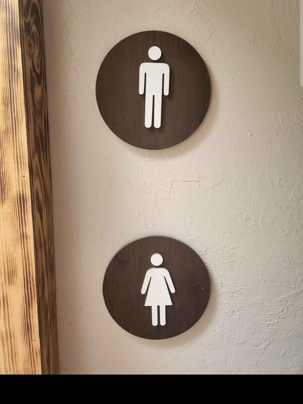 Brown Wood Round Restroom Wall Signs with White Icons